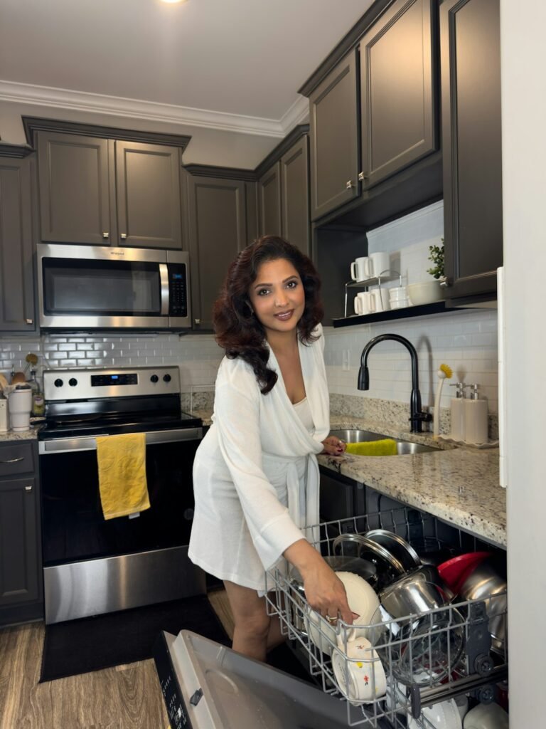 Cleaning assistant helping with kitchen work in a Delhi home