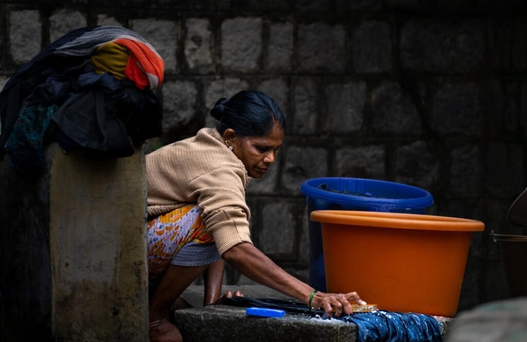 Full-time maid washing clothes, part-time vs full-time maid in Gurgaon