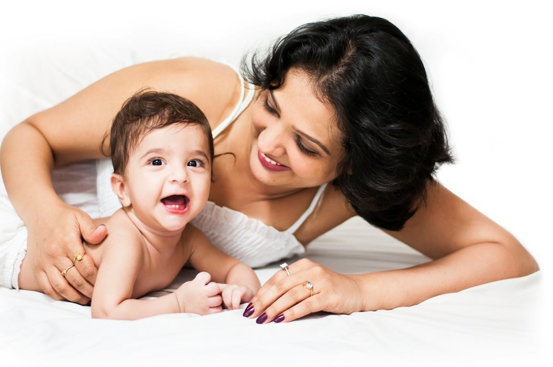 Live-in nanny caring for baby at home